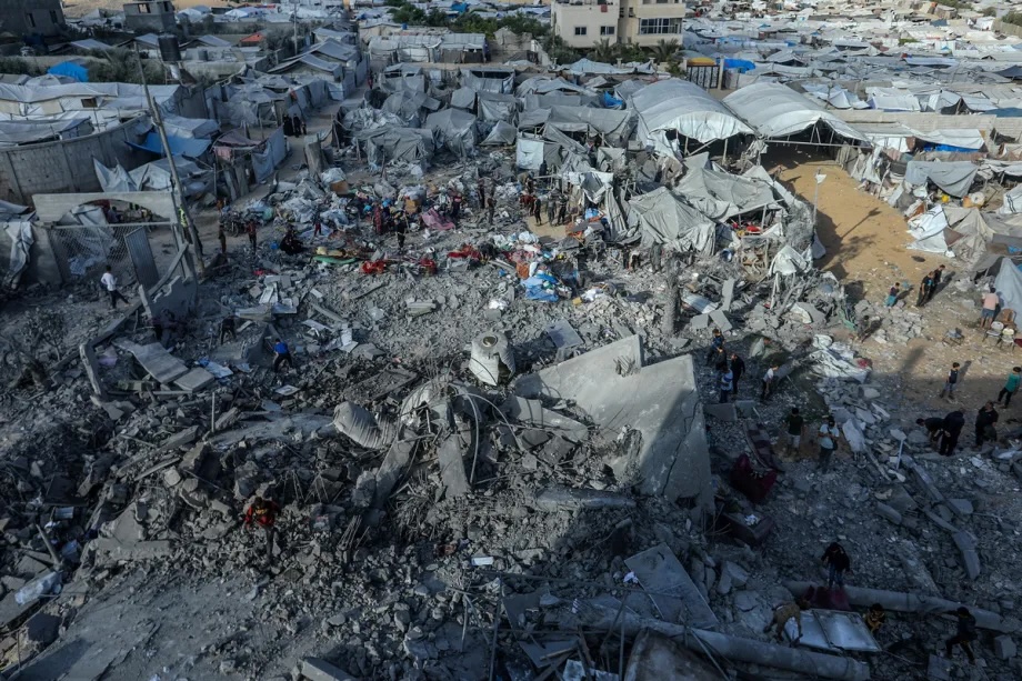 An aerial view of destruction amidst makeshift tents is seen after an Israeli airstrike targeted tents sheltering displaced Palestinians and a residential building in the Al-Mawasi area of Khan Yunis, Gaza, Palestine on June 07, 2026.