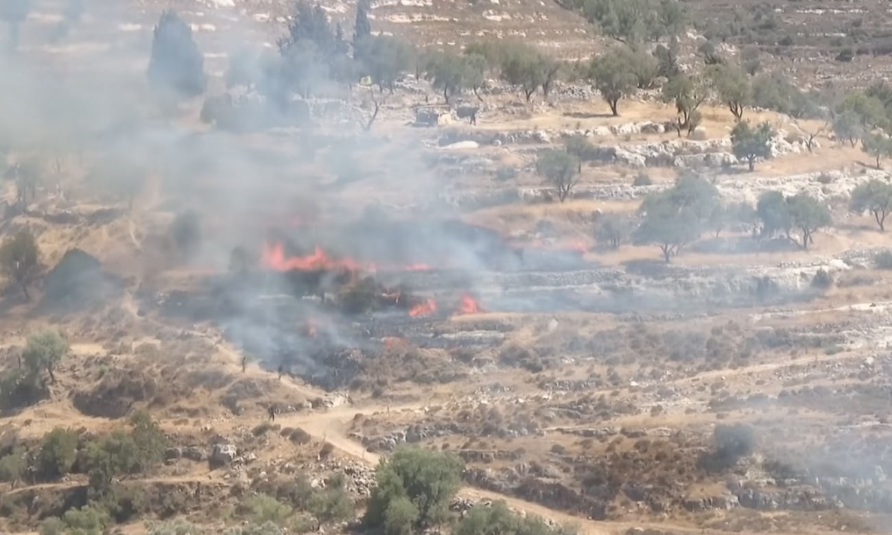 A parcel of Palestinian land near Taybeh burns after Israeli settlers started yet another fire. The Yaybeh community – one of the last entirely Christian villages in the region – faces what clergy describe as systematic targeting, with its 50,000-strong minority doubly vulnerable as both Palestinians and Christians.