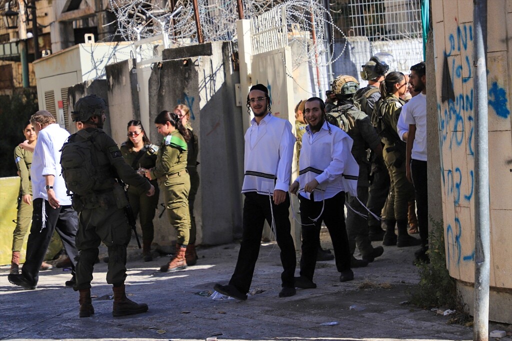 Israelis raid the Old City area, restricting Palestinian movement as military units block the entrances on June 13, 2026, in Hebron, West Bank.