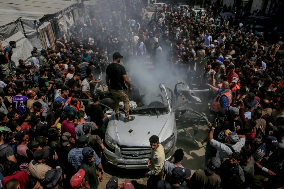 A destroyed vehicle after an Israeli strike targeted a civilian car at the crowded Abu Hudayra Junction in central Gaza City despite the ceasefire, killing three Palestinians, on June 18, 2026.