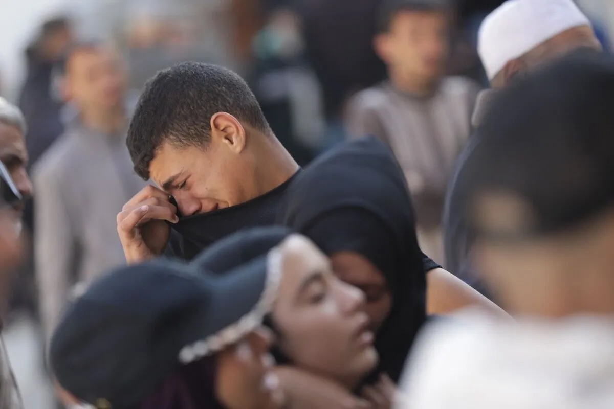 Relatives of the al-Tanani family mourn for a mother pregnant with twins and her two children, who were killed in an Israeli airstrike on their home in Beit Lahiya, in Gaza City, Palestine on April 25, 2026.