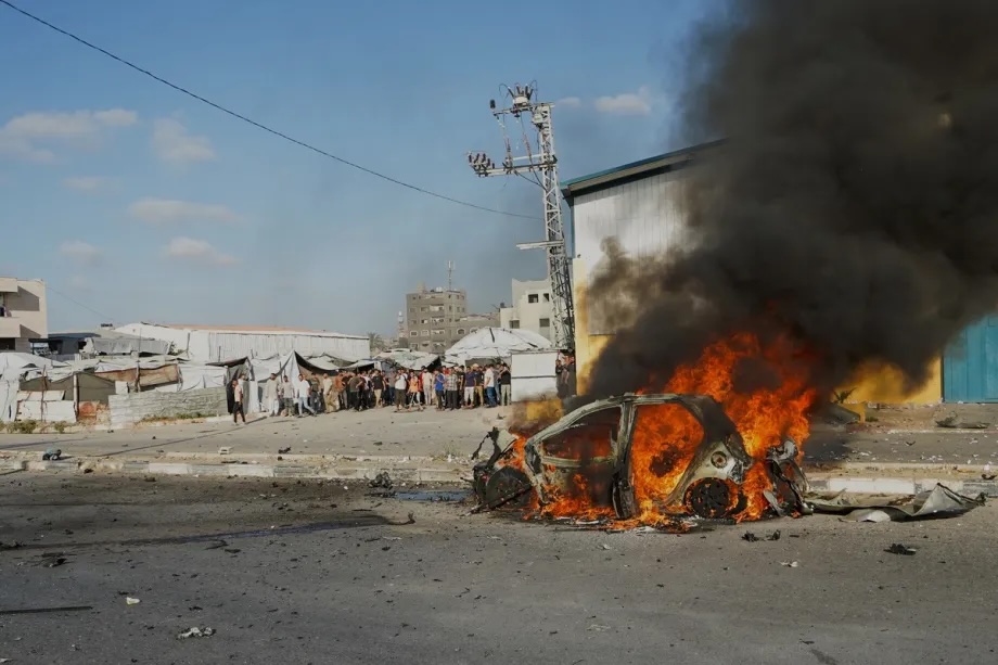A view of a burned-out vehicle on Salah al-Din Street in central Gaza, Palestine following an Israeli strike on June 26, 2026.