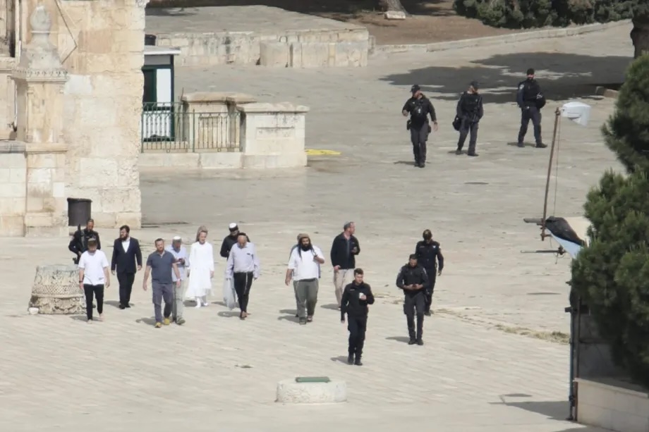 Israeli settlers, under the protection of Israeli police, enter the Al-Aqsa Mosque complex in East Jerusalem on May 21, 2026. 