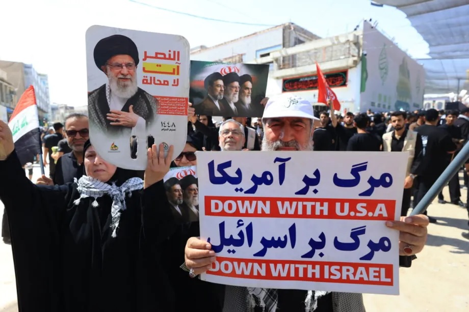 Thousands of people carrying posters of Iran’s former Supreme Leader Ali Khamenei and flags gather near the Imam Hussein Shrine in Karbala, Iraq, to attend the farewell ceremony for Khamenei, who was killed in the U.S.-Israeli attacks, on July 8, 2026.