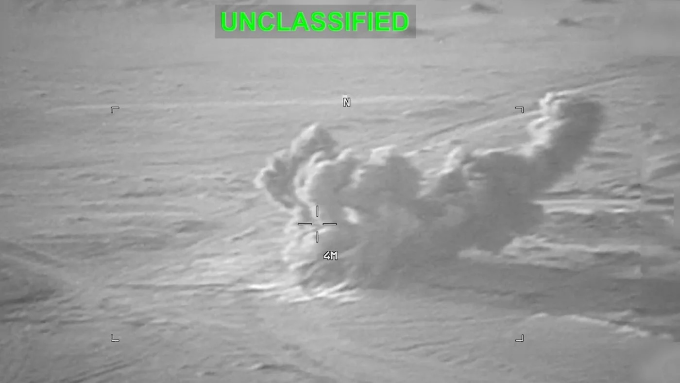 Smoke rises from an explosion at an unknown location, during what the US says are strikes on Iran, in this image dated 19 July