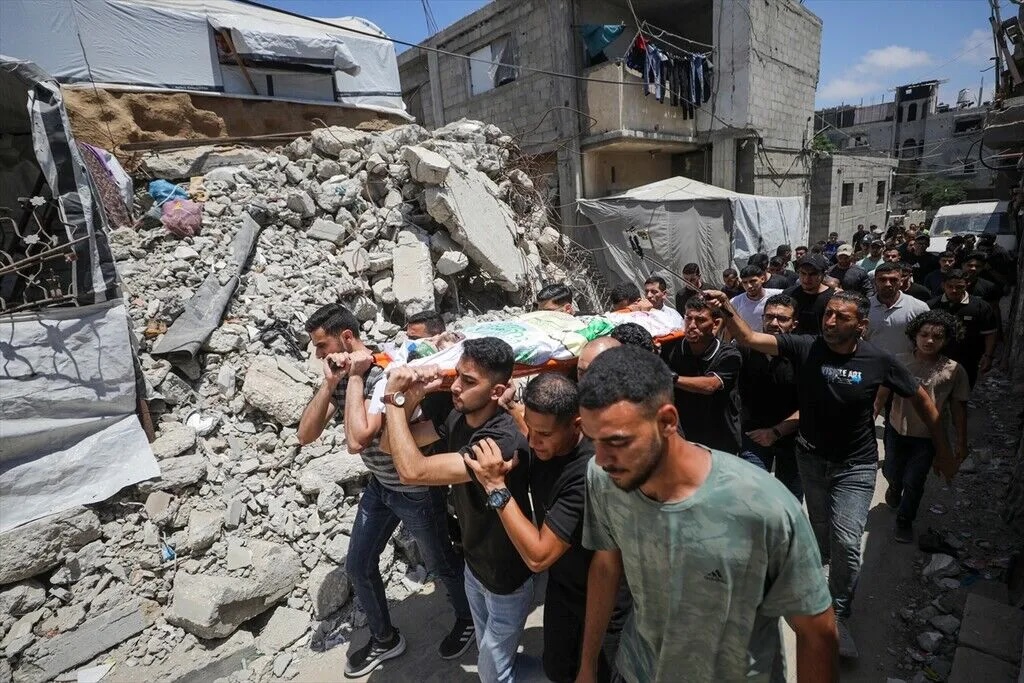 Palestinians mourn during the funeral of Abdulhamid Jarwan, who was killed in an Israeli strike on the Nuseirat refugee camp in the central Gaza Strip despite the ceasefire, in Gaza, Palestine, on July 3, 2026.
