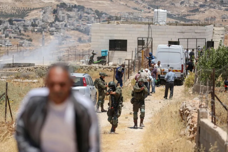 Israeli soldiers intervene with stun grenades and tear gas against Palestinians performing Friday prayers during a raid on the village of Abu Nujaym, near Bethlehem in West Bank, Palestine on July 03, 2026.