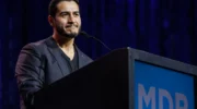 Abdul El-Sayed and Rep. Haley Stevens on the debate stage