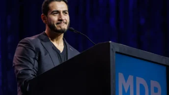 Abdul El-Sayed and Rep. Haley Stevens on the debate stage