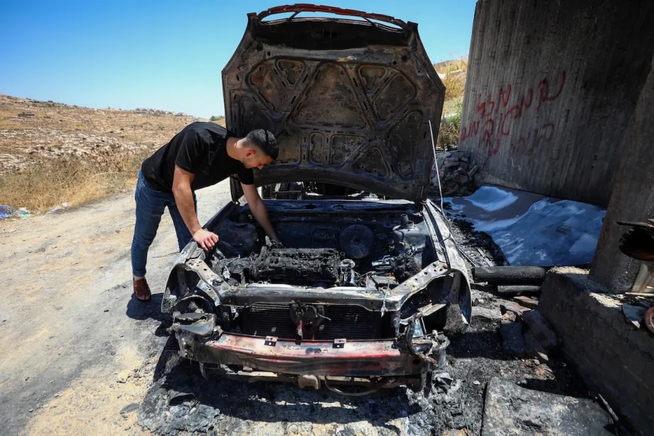 Israeli settlers set fire to a Palestinian-owned vehicle in the village of Abu Njeim, leaving the vehicle completely destroyed and unusable in southeast of Bethlehem, West Bank, Palestine on July 29, 2026.