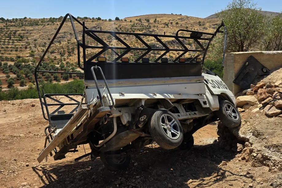 A damaged civilian vehicle is seen following a reported attack by an Israeli army unmanned aerial vehicle (UAV) in the countryside of Quneitra, Syria, on August 22, 2026.
