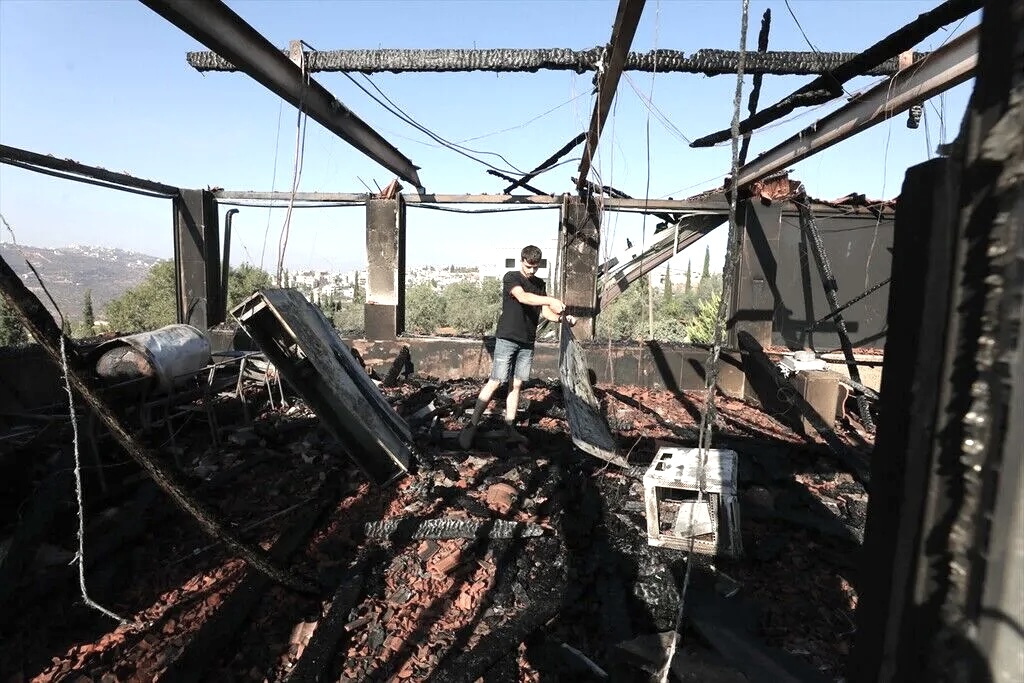 Israeli settlers torch a house and vehicles belonging to a Palestinian family in the village of Usarin, in Nablus, West Bank, Palestine on August 23, 2026.
