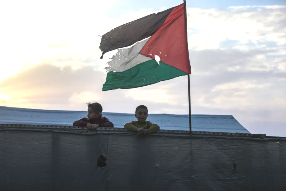 Palestinians children look out over Al-Shati refugee camp, Gaza City, Gaza, Palestine on May 14, 2026.