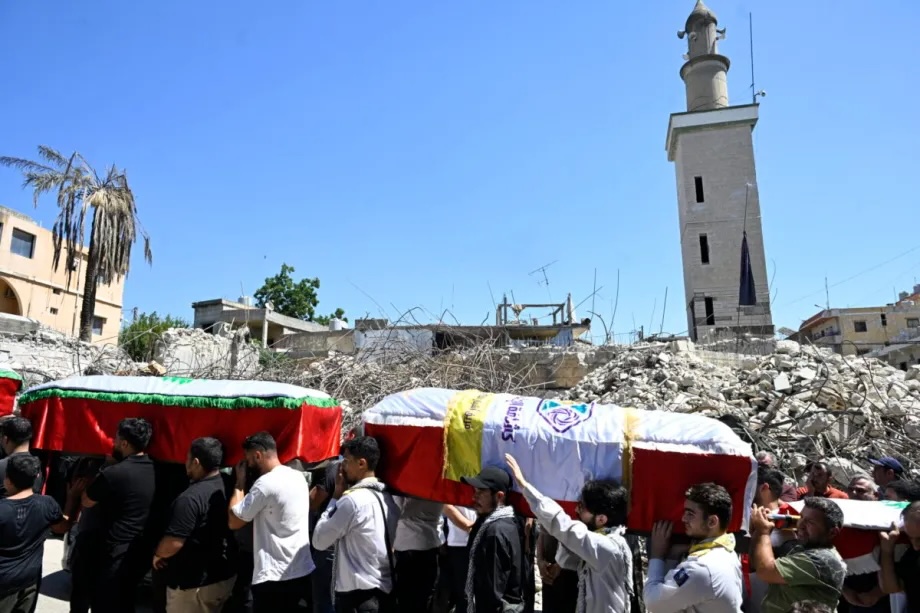People attend a mass funeral for twelve people, including two children, following the Israeli attack on Kfar Reman town of Nabatieh, Lebanon on September 8, 2026.