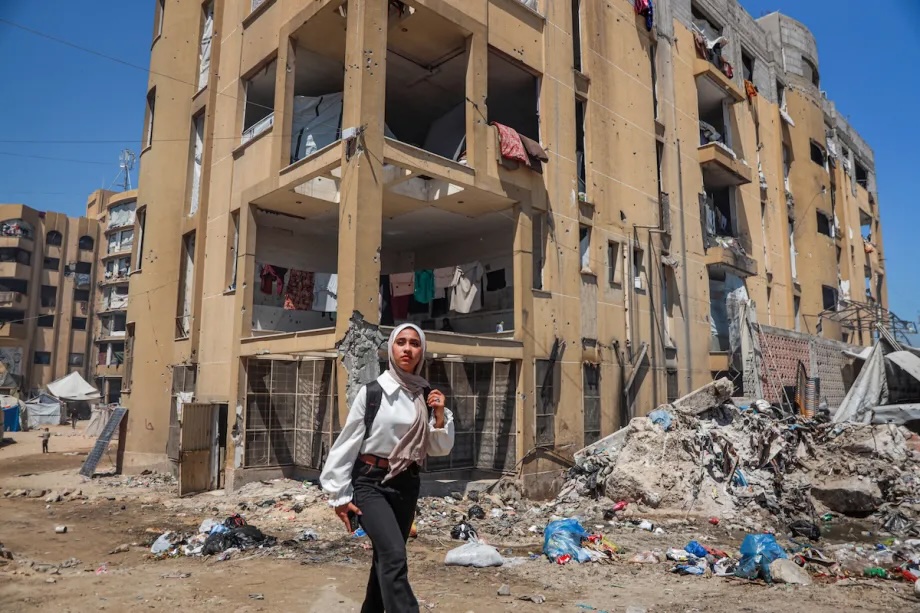 Neha Hamd, 18 year-old, who lives with her family in a damaged building on the Al-Azhar University campus, on her way to take the high school graduation exam as the education infrastructure has been severely damaged by Israeli attacks, exams have begun online for the third time in Beit Hanoun, Gaza, Palestine, on June 20, 2026.
