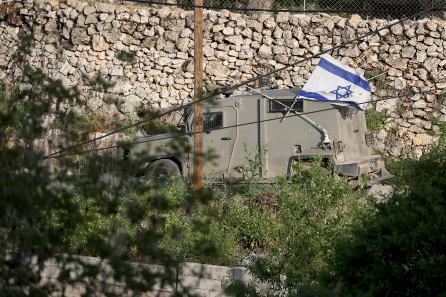 Israeli forces patrol the area after Palestinian-owned houses were set on fire by Israeli settlers in the village of Jalud, south of Nablus, West Bank, Palestine on April 27, 2026.