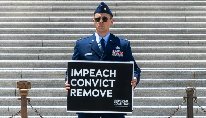 Air Force Major Who Called for Trump’s Impeachment Held in Solitary Confinement
